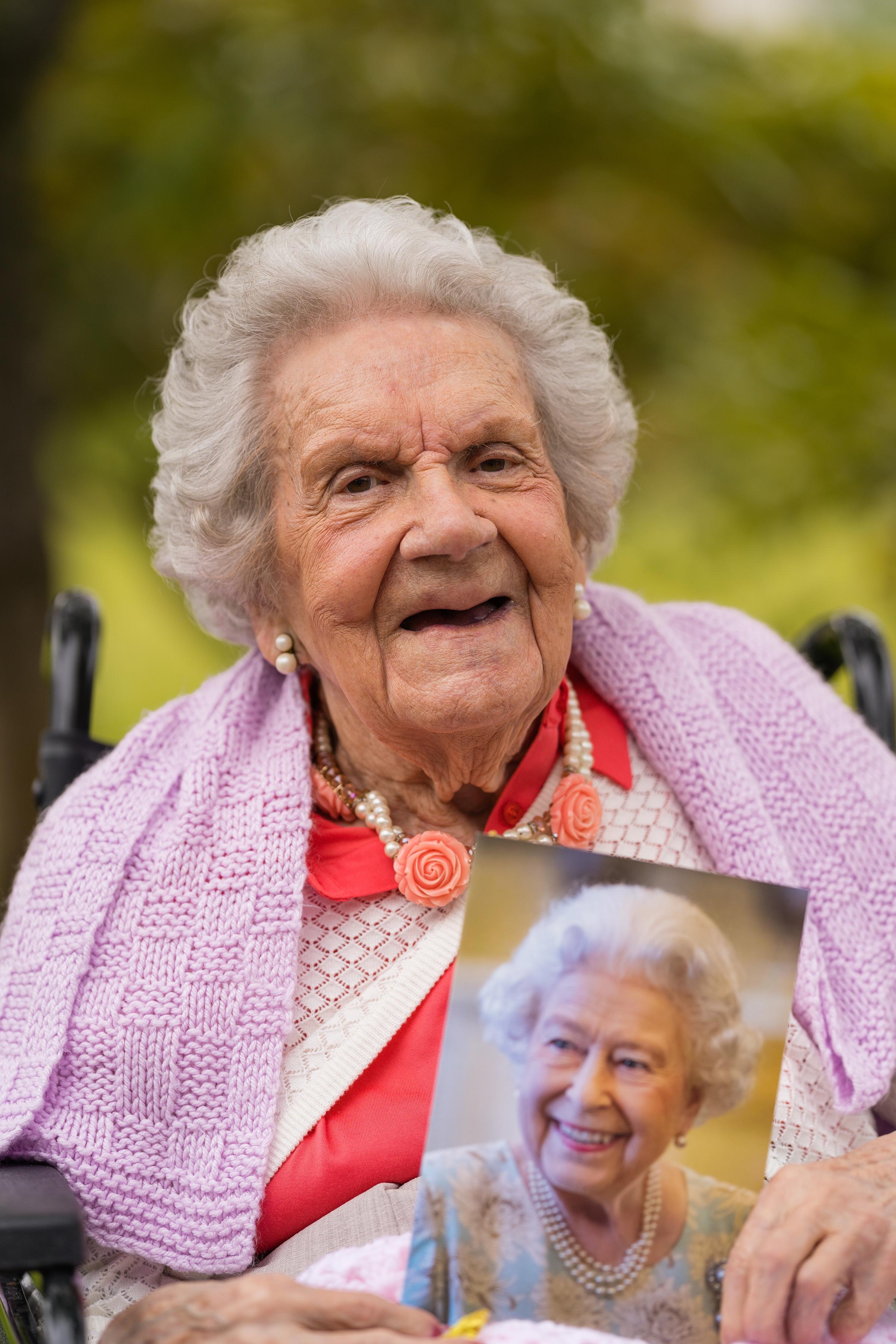 Helena Graham, holding her birthday card from Her Majesty, The Queen, celebrated her 100th birthday with her family bubble in June at County Care Home, Enniskillen. Photo: Ronan McGrade.