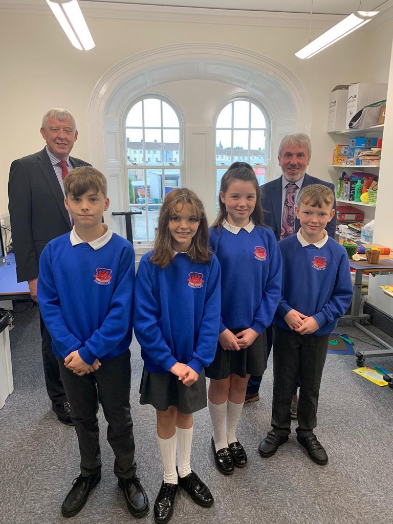 Inside the new Music Room, located upstairs in the listed building. P7 pupils who escorted the visitors are Carly Latimer, Michaela Swift, Joshua Allen and Jack Cairn