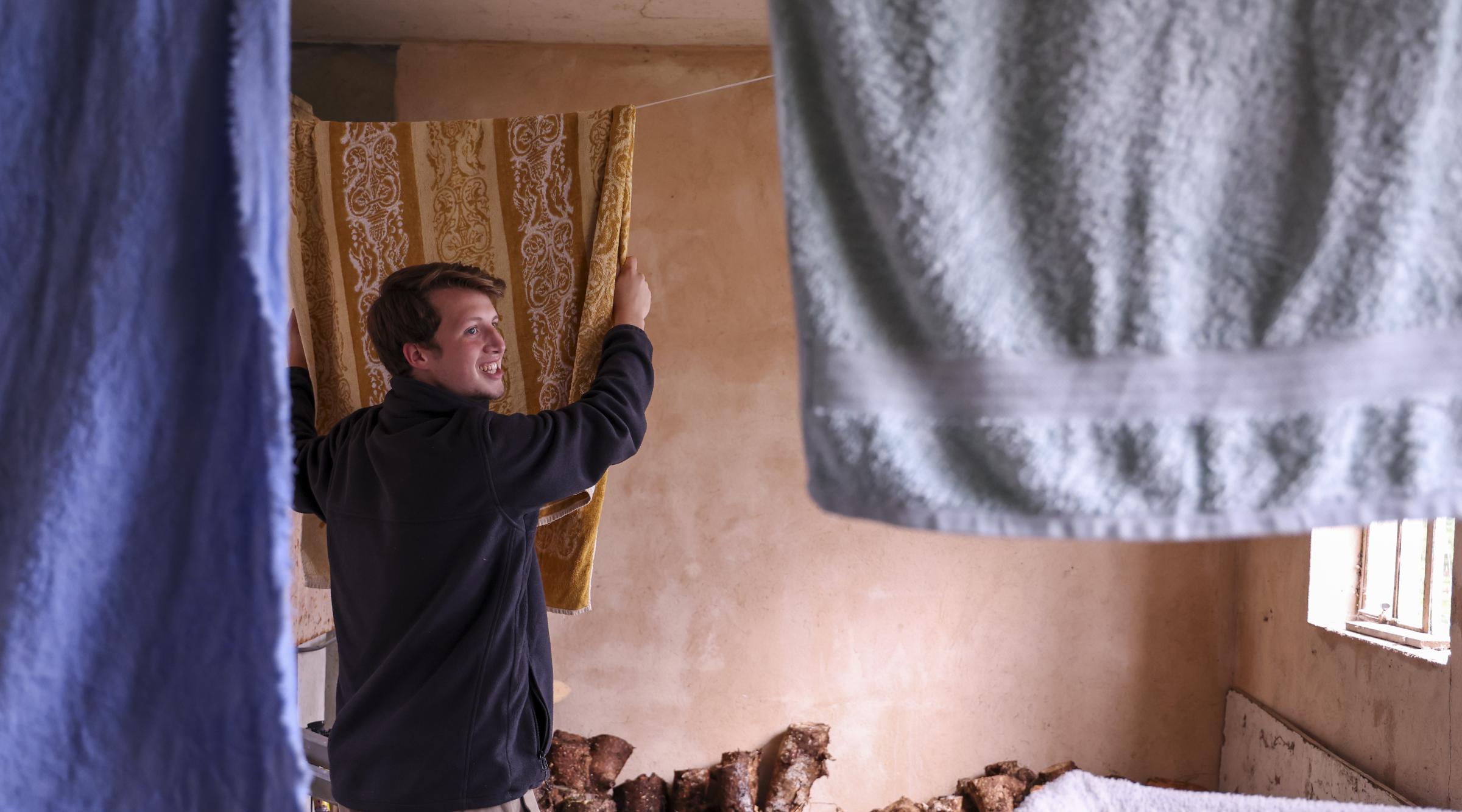 Eric Seip, Virginia USA, putting out cloths on the line.