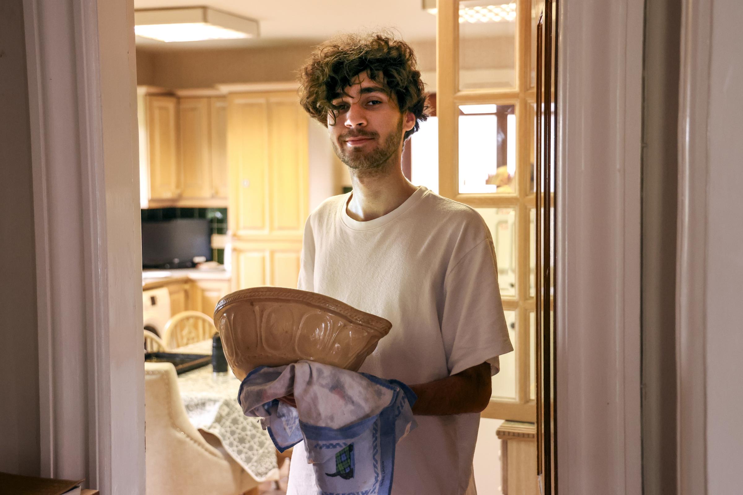 John Stoll, from Switzerland helping out in the kitchen.